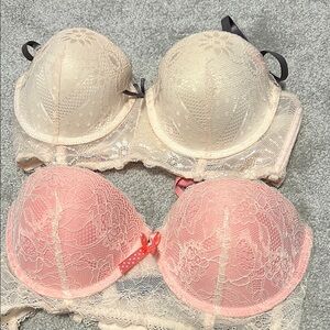 Two like new bras pink & cream lace size 36C